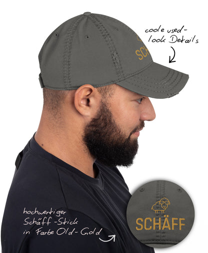 Mann mit grauem Vintage Schäff Dad-Hat in Seitenansicht; Cap mit hochwertigem SCHÄFF-Stick und coolen used-look Details.
