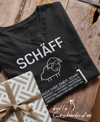 Schwarzes Schäff T-Shirt mit V-Neck für den Chef; daneben ein verpacktes Geschenk mit Schleife und dem Hinweis ‚tolle Geschenkidee’.