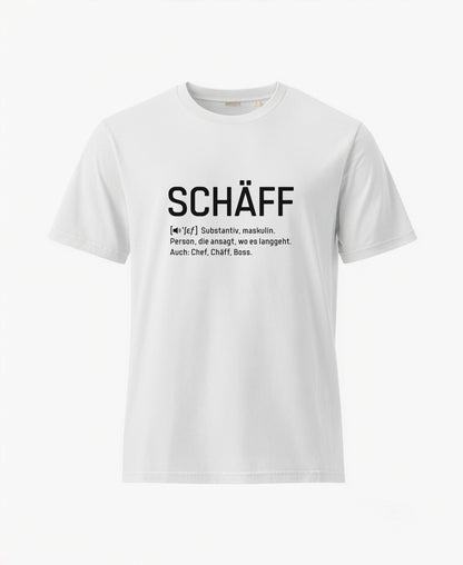 Weißes T-Shirt mit schwarzem Frontaufdruck im Wörterbuch-Stil: SCHÄFF – Substantiv, maskulin. Person, die ansagt, wo es langgeht. Auch: Chef, Chäff, Boss.