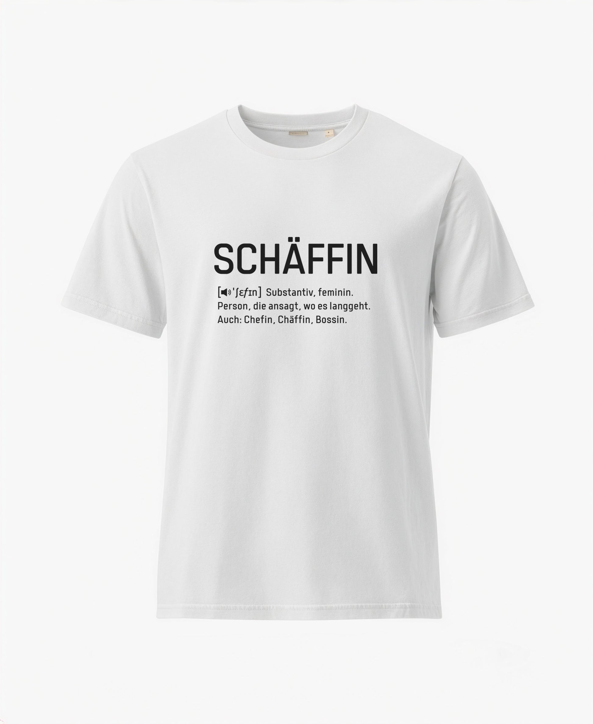 Weisses T-Shirt mit schwarzem Frontaufdruck im Wörterbuch-Stil: SCHÄFFIN – Substantiv, feminin. Person, die ansagt, wo es langgeht. Auch: Chefin, Chäffin, Bossin.