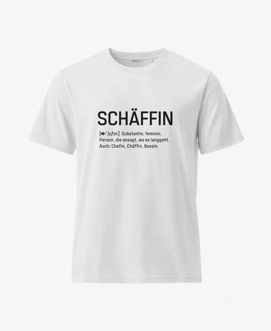 Weisses T-Shirt mit schwarzem Frontaufdruck im Wörterbuch-Stil: SCHÄFFIN – Substantiv, feminin. Person, die ansagt, wo es langgeht. Auch: Chefin, Chäffin, Bossin.