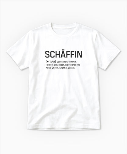 Weisses T-Shirt mit schwarzem Frontaufdruck im Wörterbuch-Stil: SCHÄFFIN – Substantiv, feminin. Person, die ansagt, wo es langgeht. Auch: Chefin, Chäffin, Bossin.