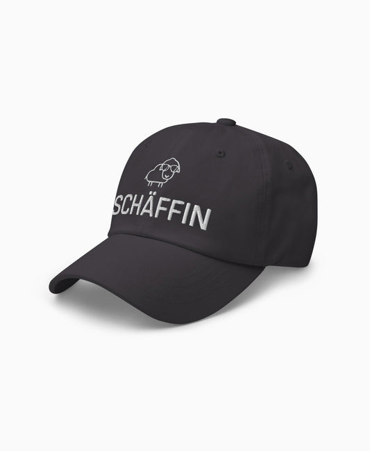 Dunkelgraue Dad-Hat mit SCHÄFFIN Stickmotiv: cooles Schaf mit Sonnenbrille – dezente Cap für die Chefin.