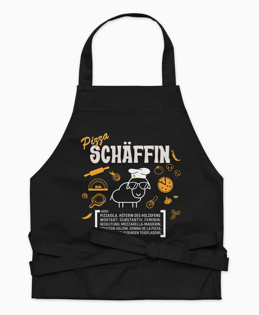Schwarze Premium Pizza SCHÄFFIN Kochschürze aus Bio-Baumwolle mit witzigem Wörterbuch-Design und zwei großen Vordertaschen auf weißem Hintergrund.