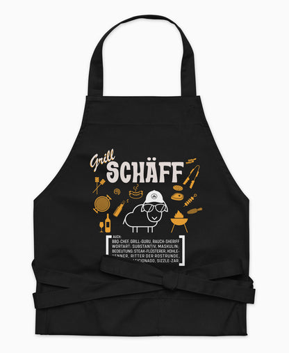 Schwarze Premium Grill SCHÄFF Kochschürze aus Bio-Baumwolle mit witzigem Wörterbuch-Design und zwei großen Vordertaschen auf weißem Hintergrund.