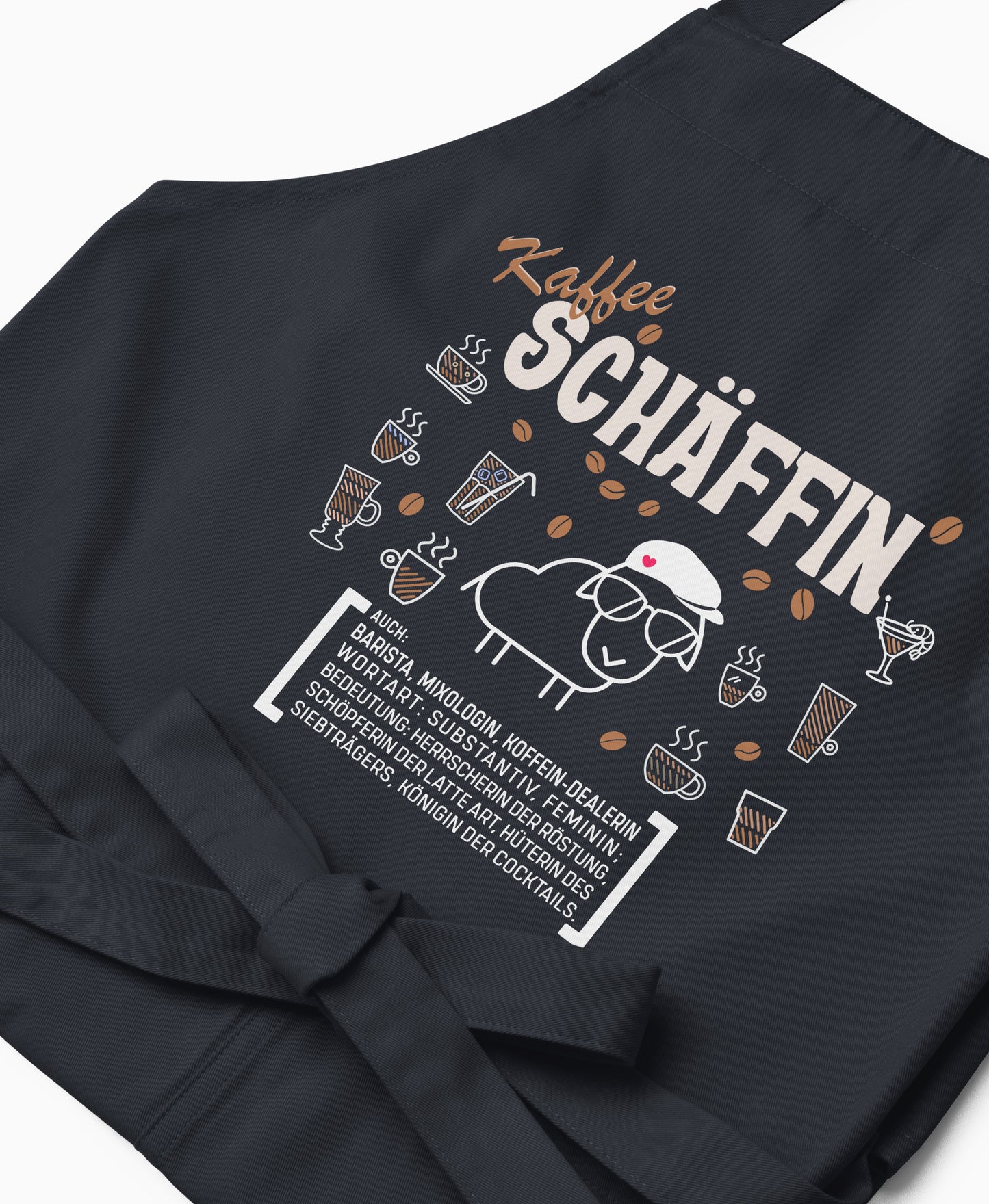 Nahaufnahme der dunkelblauen Kaffee SCHÄFFIN Kochschürze mit detailreichem, braun-weißem Aufdruck.