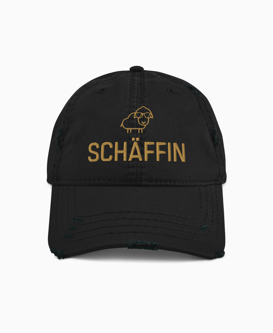 Schwarzer Dad-Hat im Used-Look mit SCHÄFFIN Stickerei in Old-Gold vorne – lässige Cap für die humorvolle Chefin.